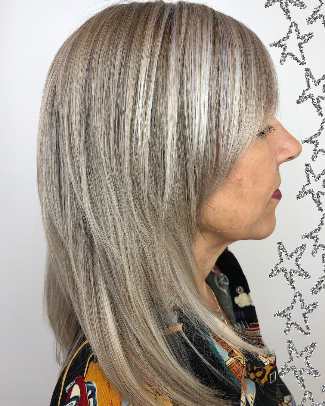 12. Layered Silver Blonde with Face-Framing Length - Gray Hair Color