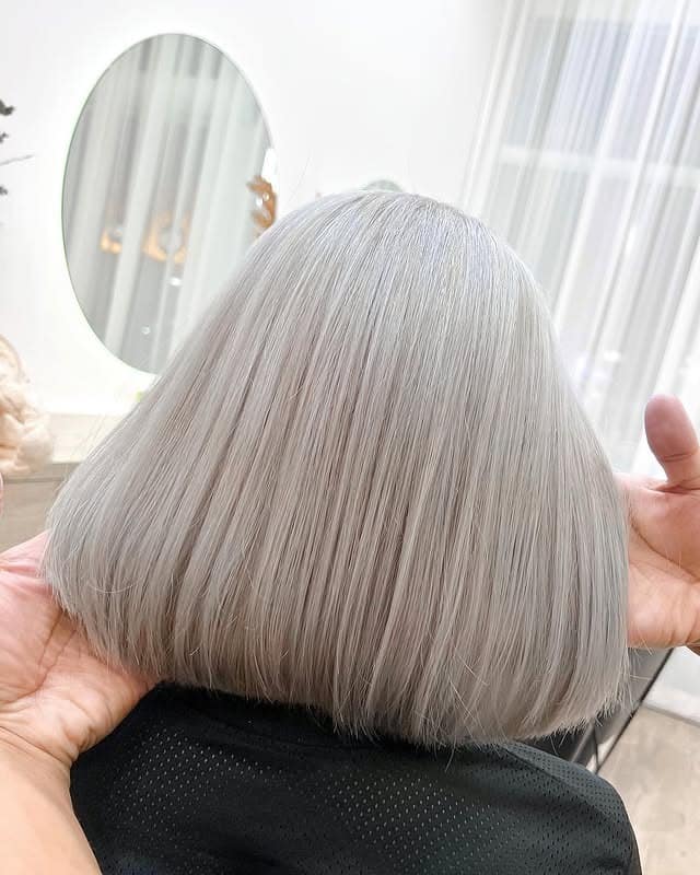 13. Blunt Silver Bob with Smooth Finish - Gray Hair Color