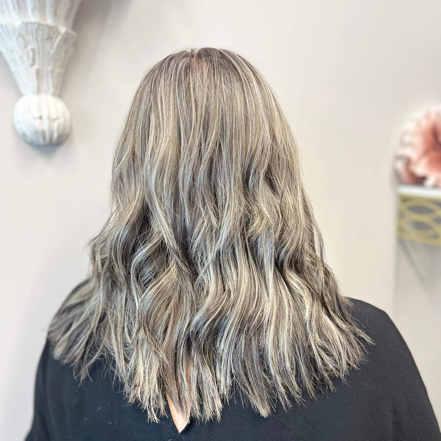 20. Textured Gray Waves with Layered Ends - Gray Hair Color