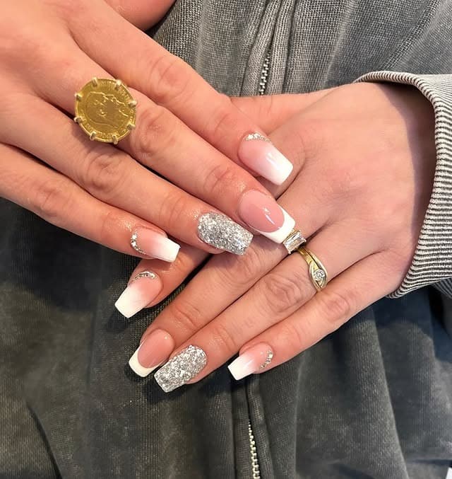 2. Classic French with Silver Glitter Accent - silver glitter nail ideas