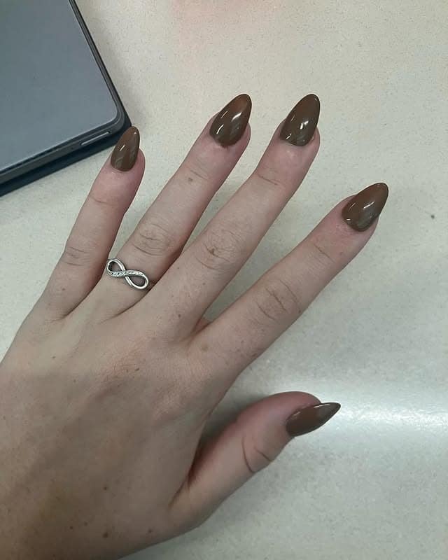 11. Glossy Brown Almond Nails - simple brown nail ideas