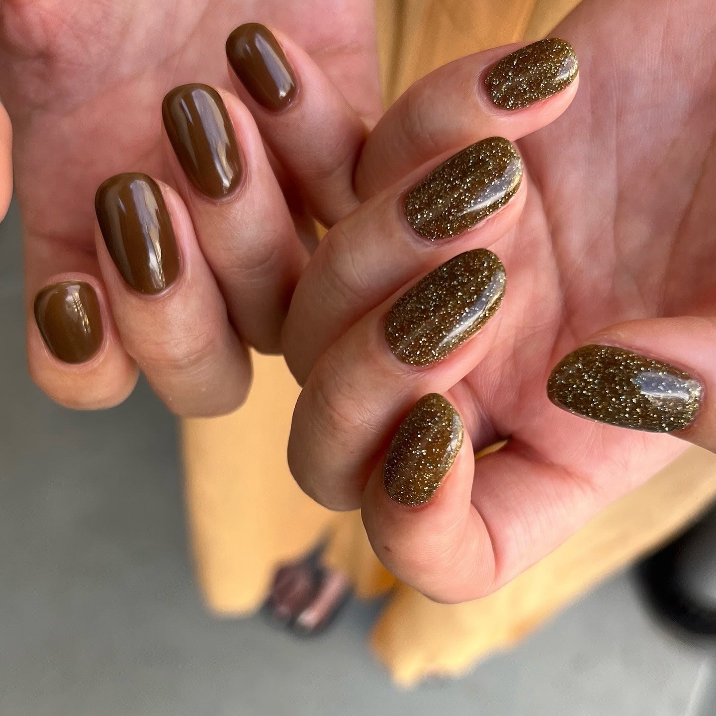 14. Brown Nails with Gold Texture Accent - simple brown nail ideas