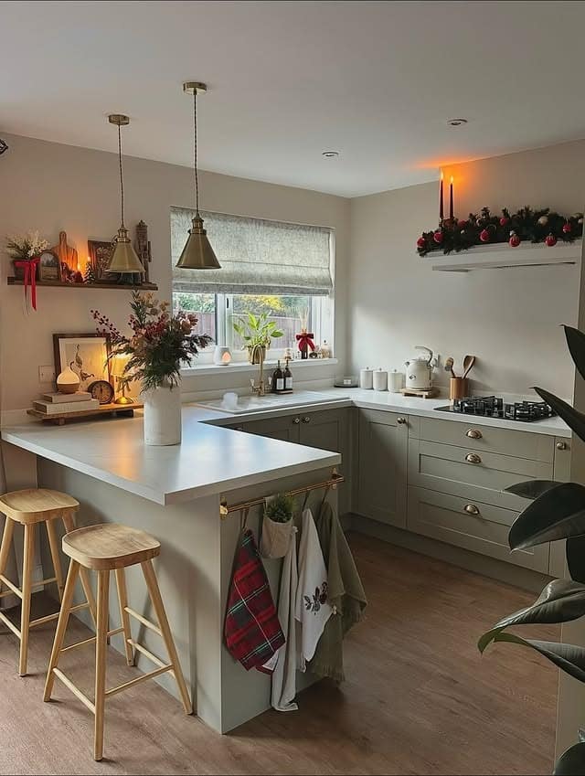 1. Soft Sage Cottage Kitchen with Warm Brass Accents - small cozy kitchen ideas