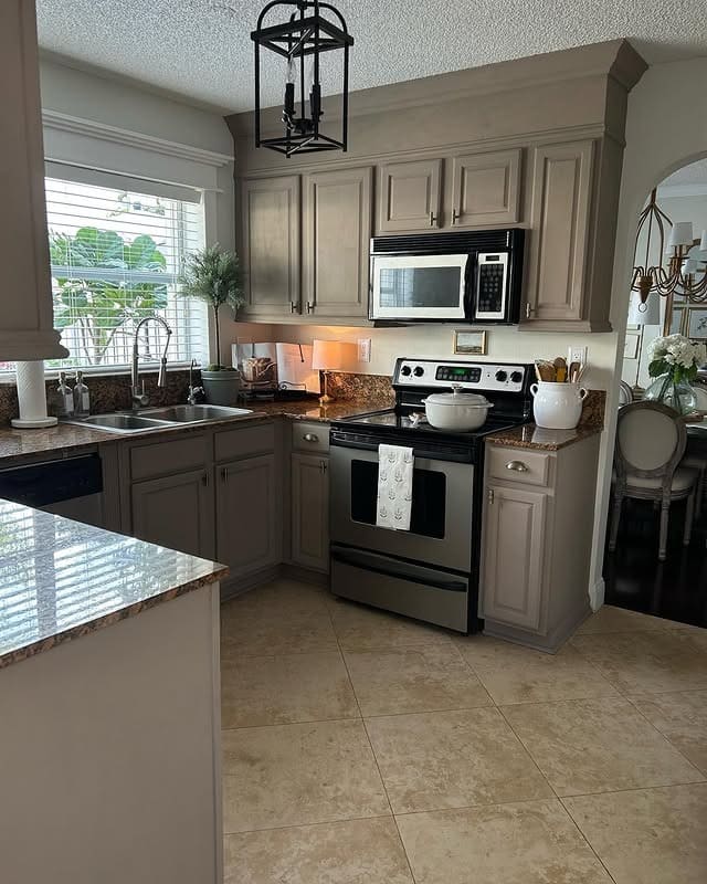 5. Neutral Taupe Kitchen with Granite Counters and Traditional Lines - small cozy kitchen ideas