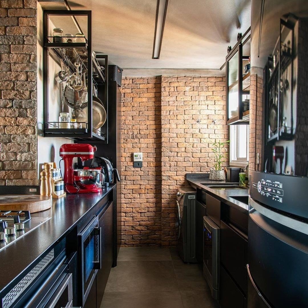 9. Elegant White Kitchen with Statement Range and Stone Backsplash - small cozy kitchen ideas