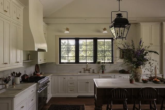 11. Classic Cream Kitchen with Dark Wood Island - small cozy kitchen ideas