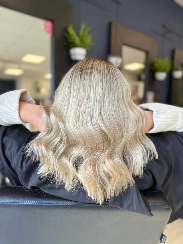 3. Creamy Blonde Mid-Length Waves - Blonde Hair Color