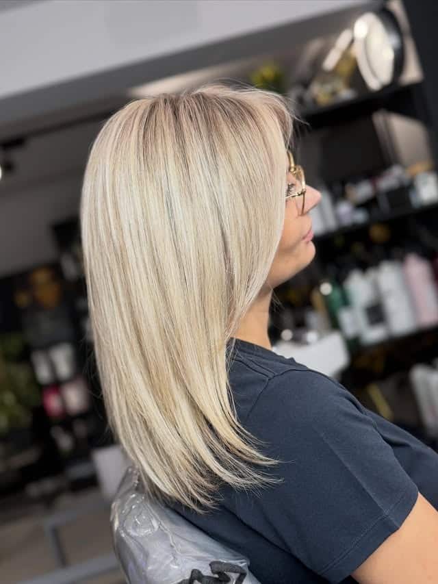 5. Classic Long Blonde Layers with Smooth Finish - Blonde Hair Color