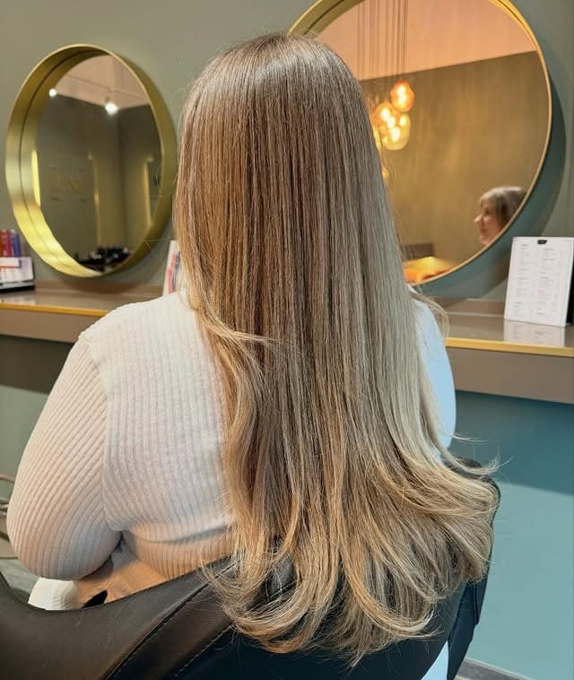 14. Natural Blonde Layers with Feathered Ends - Blonde Hair Color