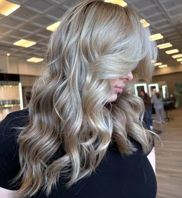 19. Soft Neutral Blonde with Polished Waves - Blonde Hair Color
