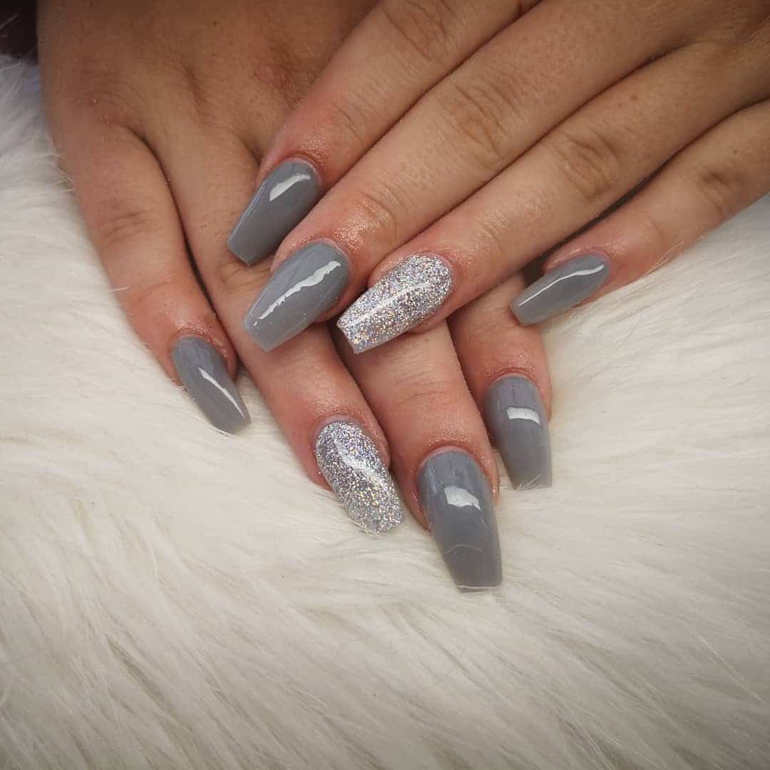 4. Glossy Charcoal Grey Nails with Silver Statement Accent - simple grey nail ideas
