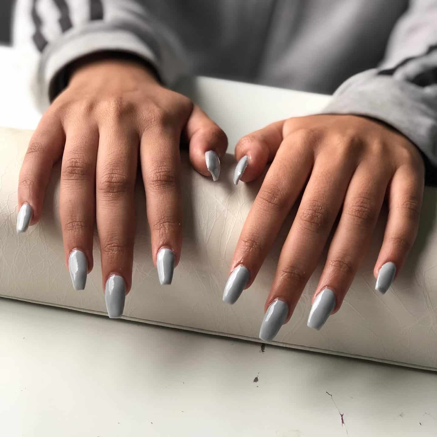 8. Light Grey Coffin Nails with High-Gloss Finish - simple grey nail ideas