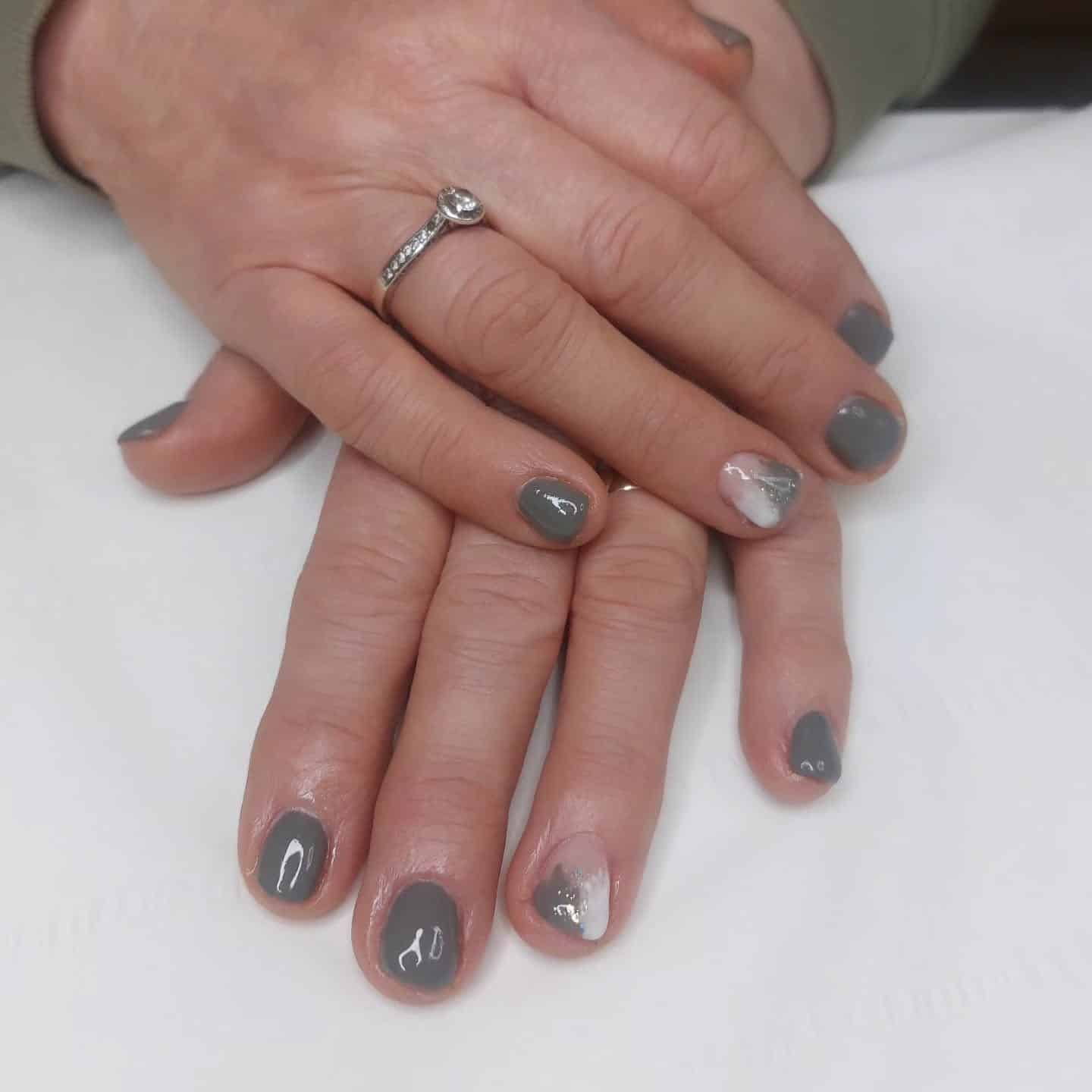 9. Short Grey Nails with Subtle Marble Accent - simple grey nail ideas