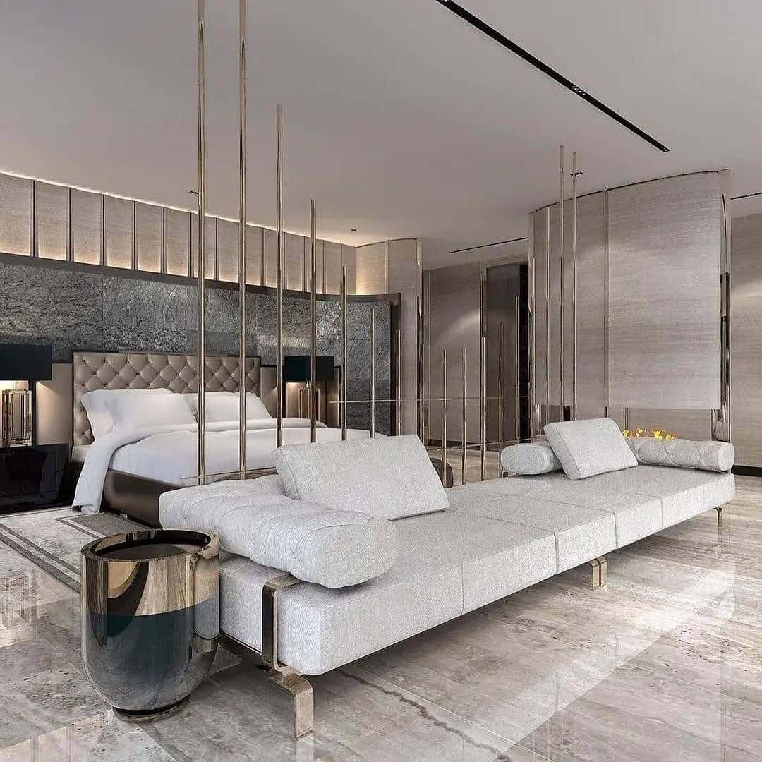 15. Luxury Gray Bedroom With Contemporary Lounge Seating - black, white and gray bedroom ideas