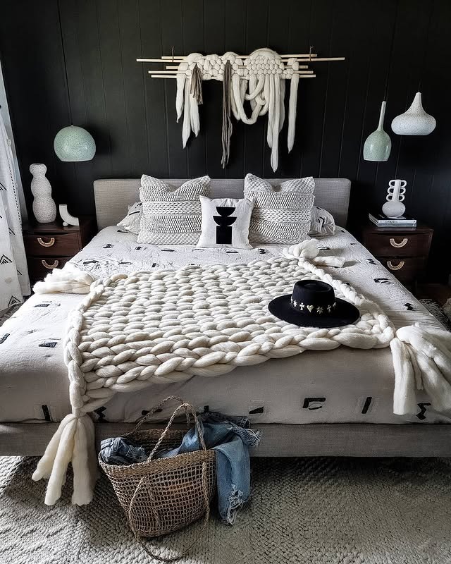 17. Textured Gray Bedroom With Artistic Wall Decor - black, white and gray bedroom ideas