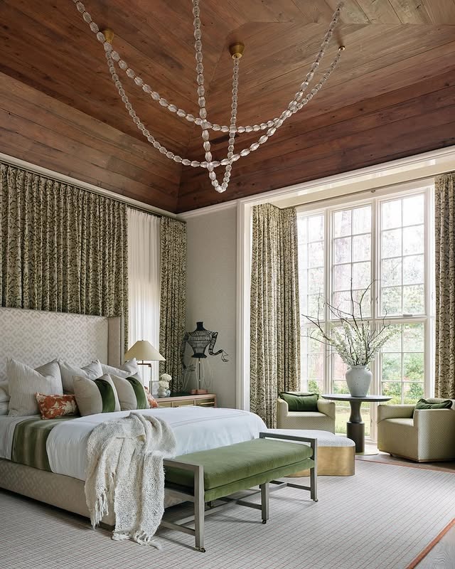 3. Nature-Framed Light Green Elegance - light green bedroom ideas