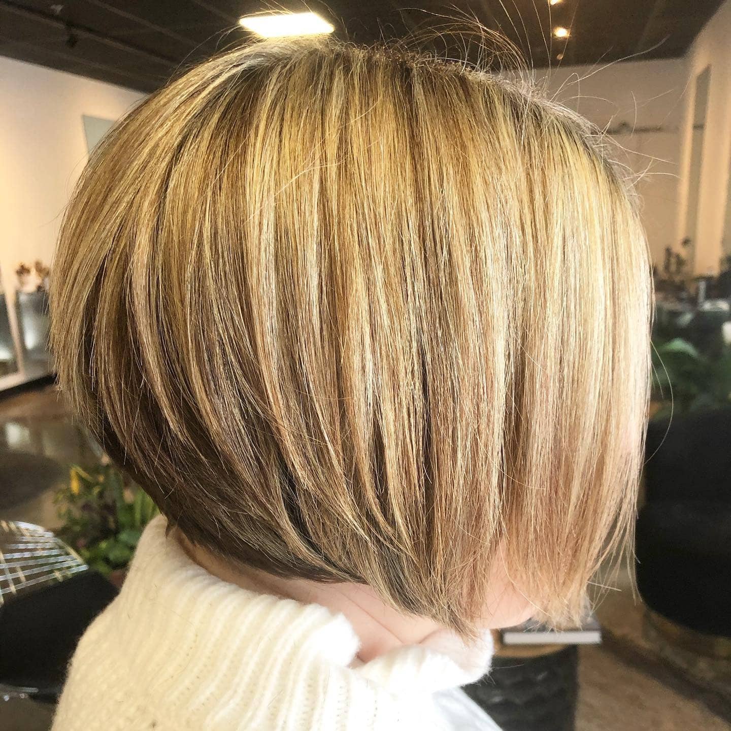 7. Feathered Stacked Bob in Golden Blonde - Stacked Bob Hair