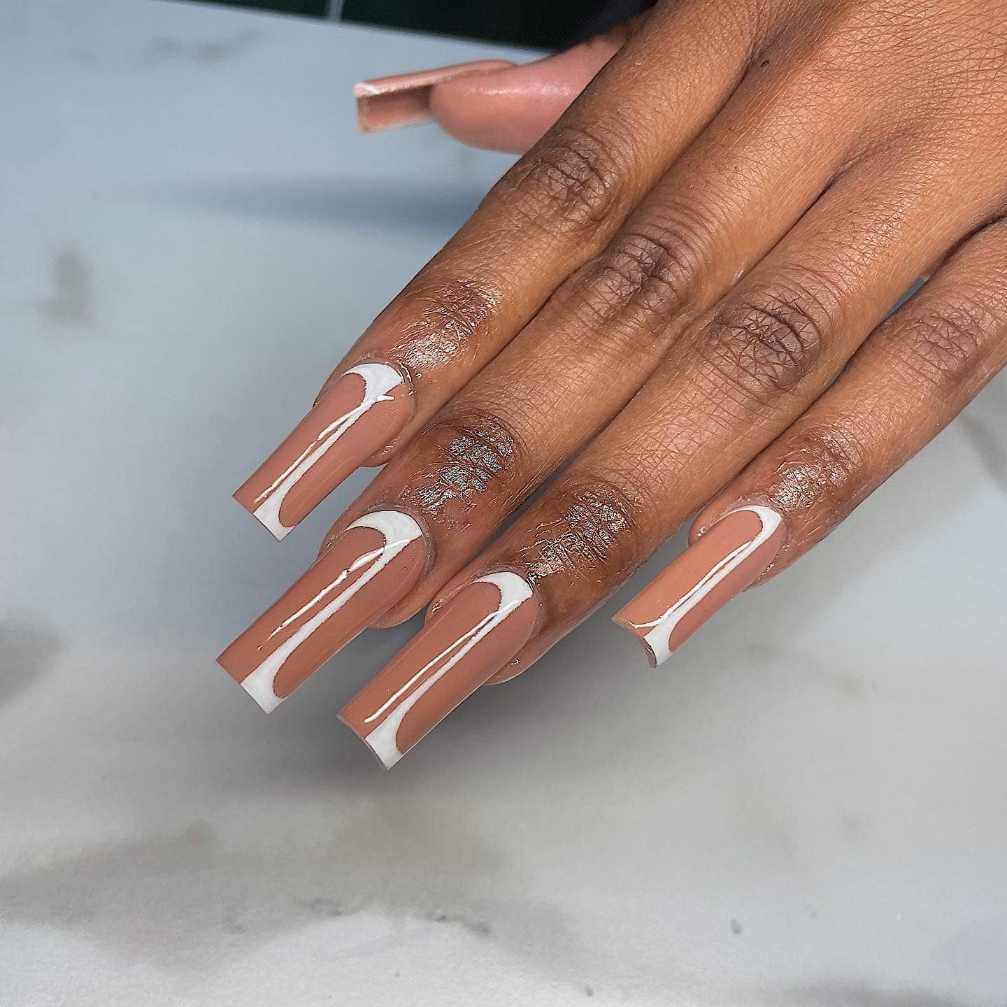 1. Nude Coffin Nails with White Contour Lines - simple line nail ideas