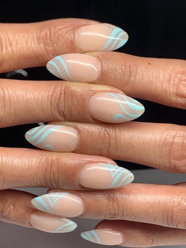 4. Almond Nude Nails with Light Blue Flowing Lines - simple line nail ideas