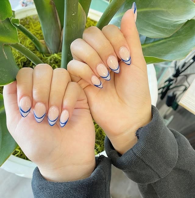 5. Short Almond Nails with Blue Micro French Lines - simple line nail ideas