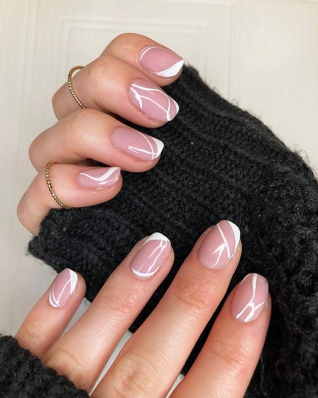 7. Short Rounded Pink Nails with White Abstract Lines - simple line nail ideas