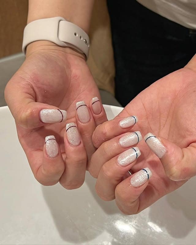 9. Square Nails with Sheer Pink and Fine Dark Tip Lines - simple line nail ideas