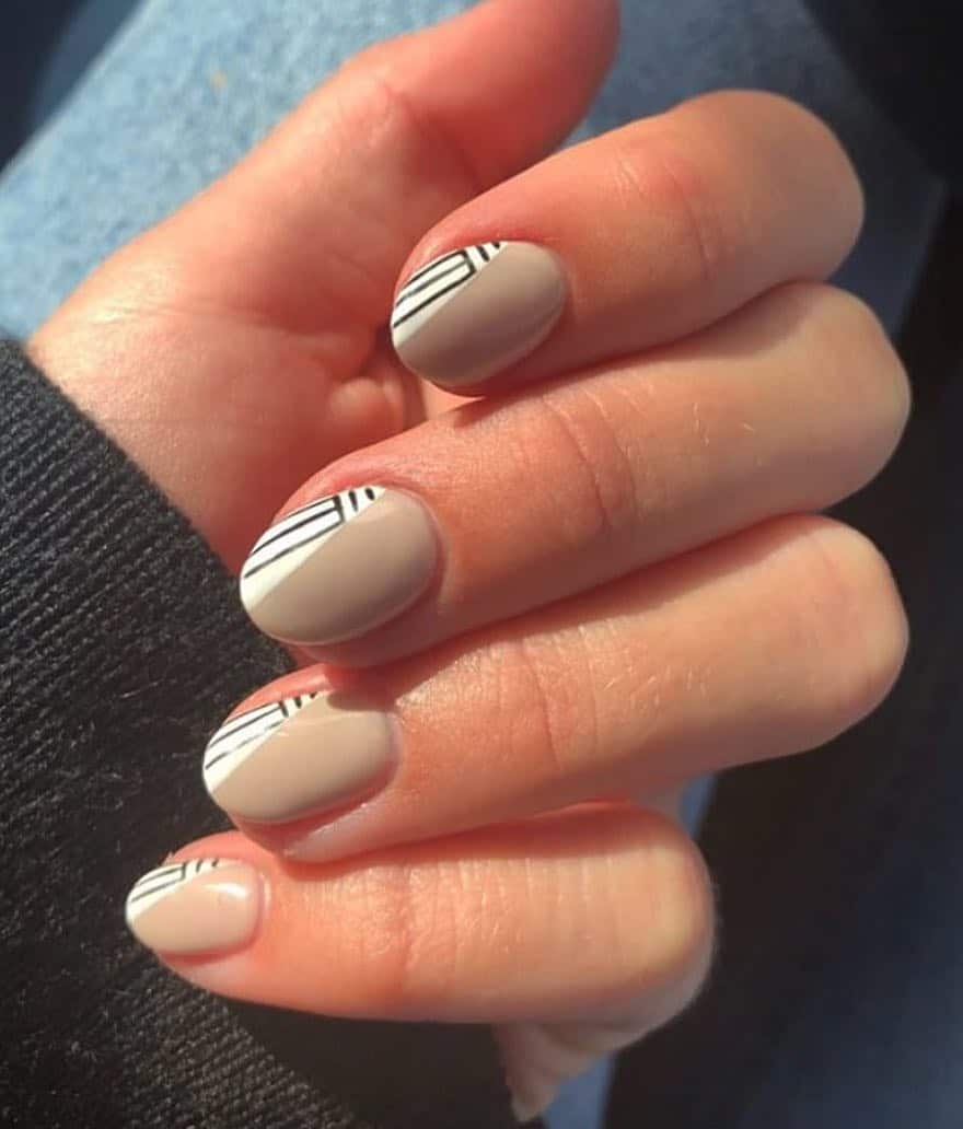 19. Short Taupe Nails with Black Diagonal Line Tips - simple line nail ideas