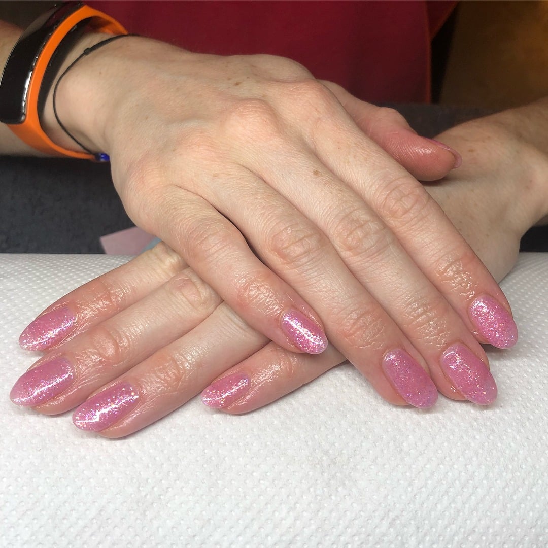 4. Soft Pink Sparkle Oval Elegance - sparkly pink nail ideas