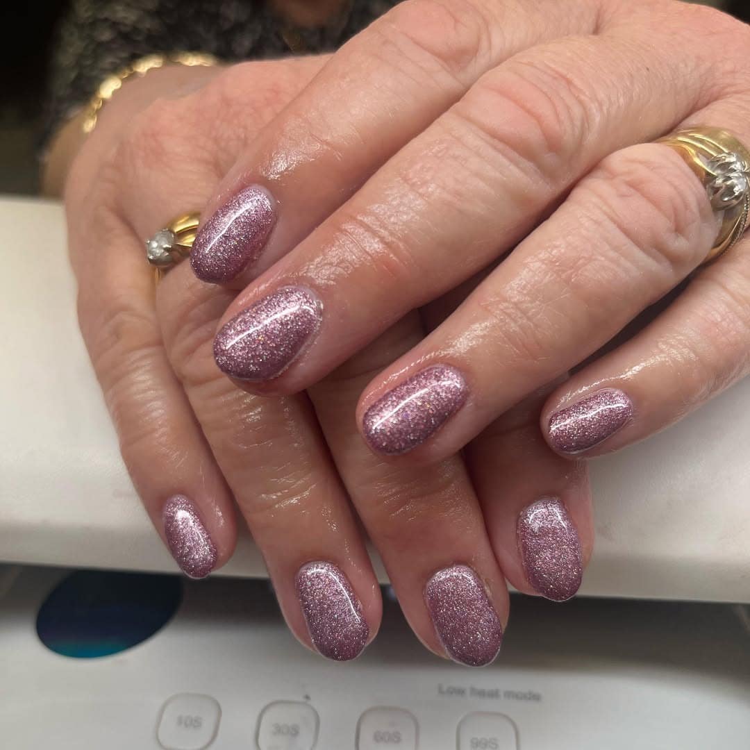 11. Soft Rose Pink Micro-Glitter Short Oval - sparkly pink nail ideas