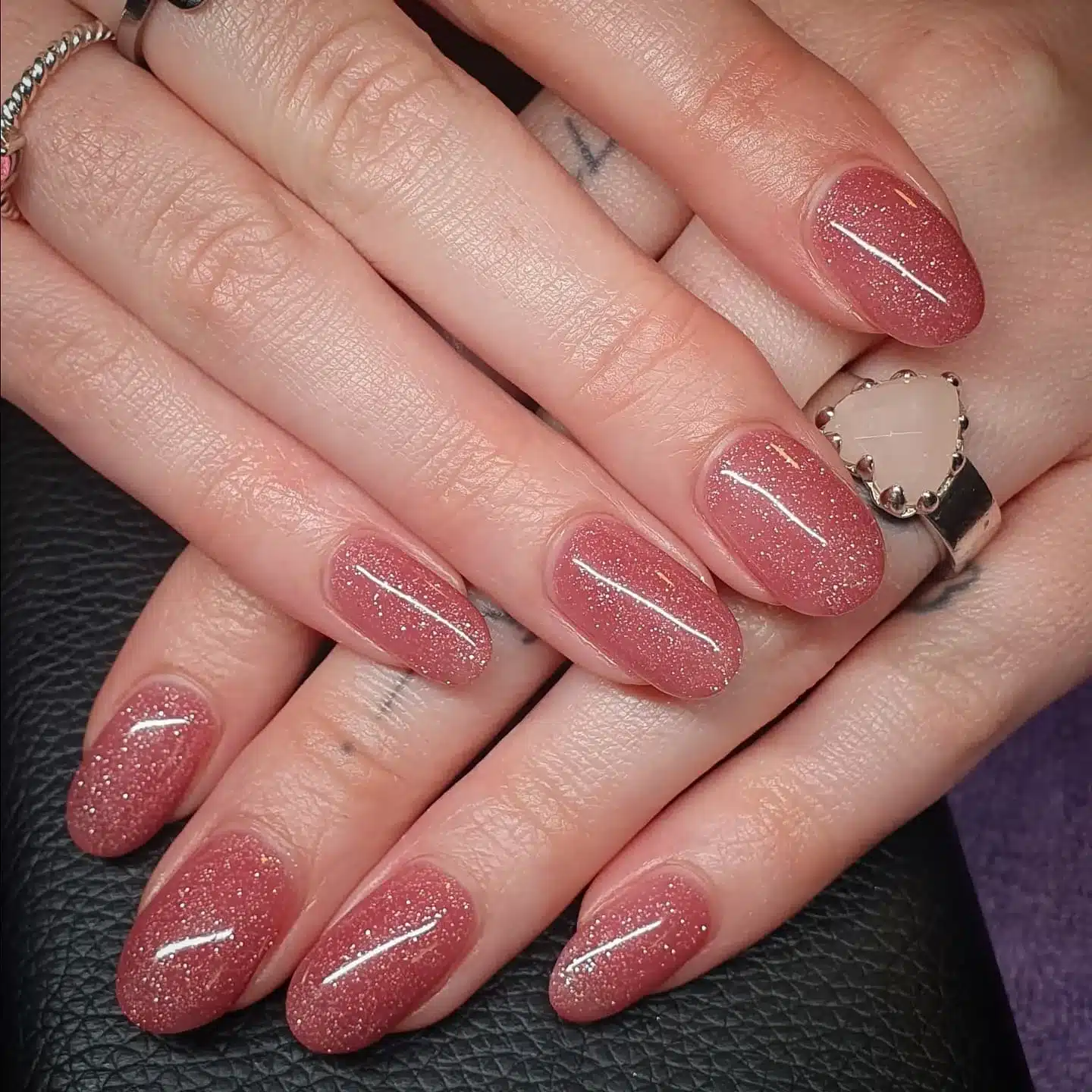 13. Dusty Rose Pink Shimmer Almond - sparkly pink nail ideas