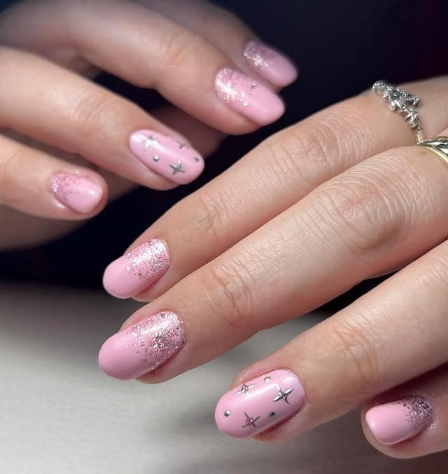 21. Baby Pink Short Oval with Star Accents - sparkly pink nail ideas