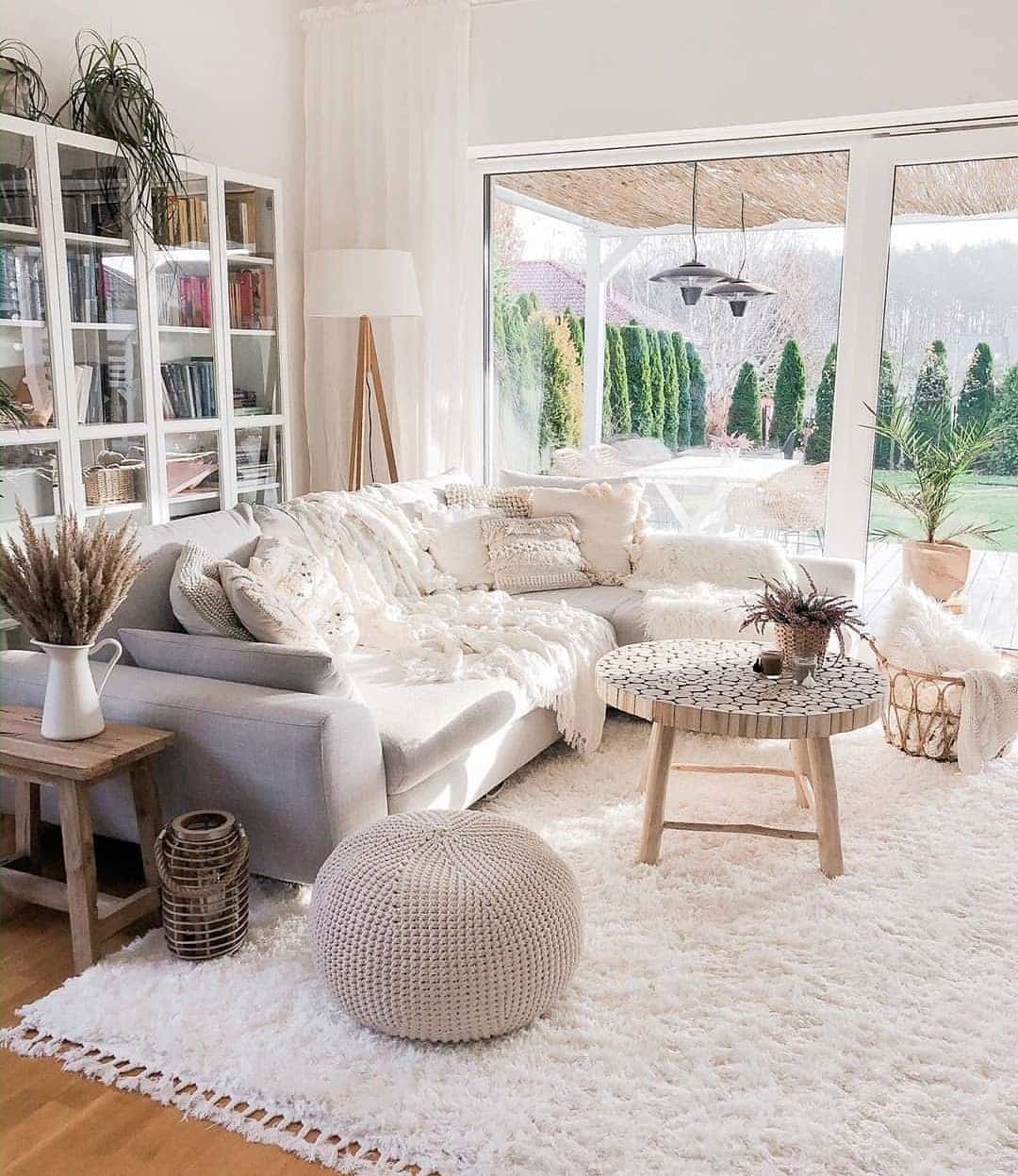 4. Cozy Scandinavian Living with Layered Whites - tiny living room ideas