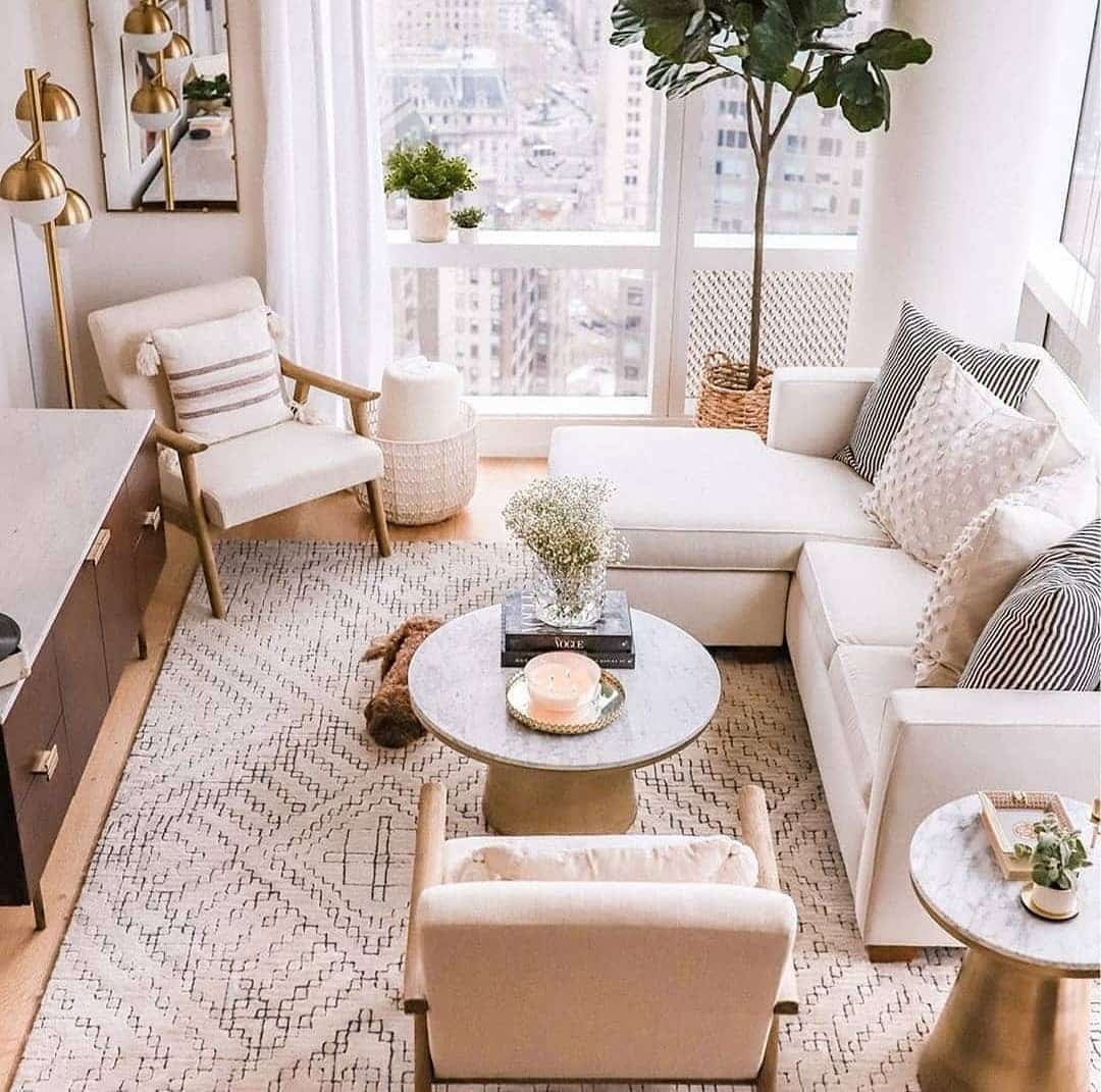 7. Warm Minimal Living with Cozy Lighting - tiny living room ideas