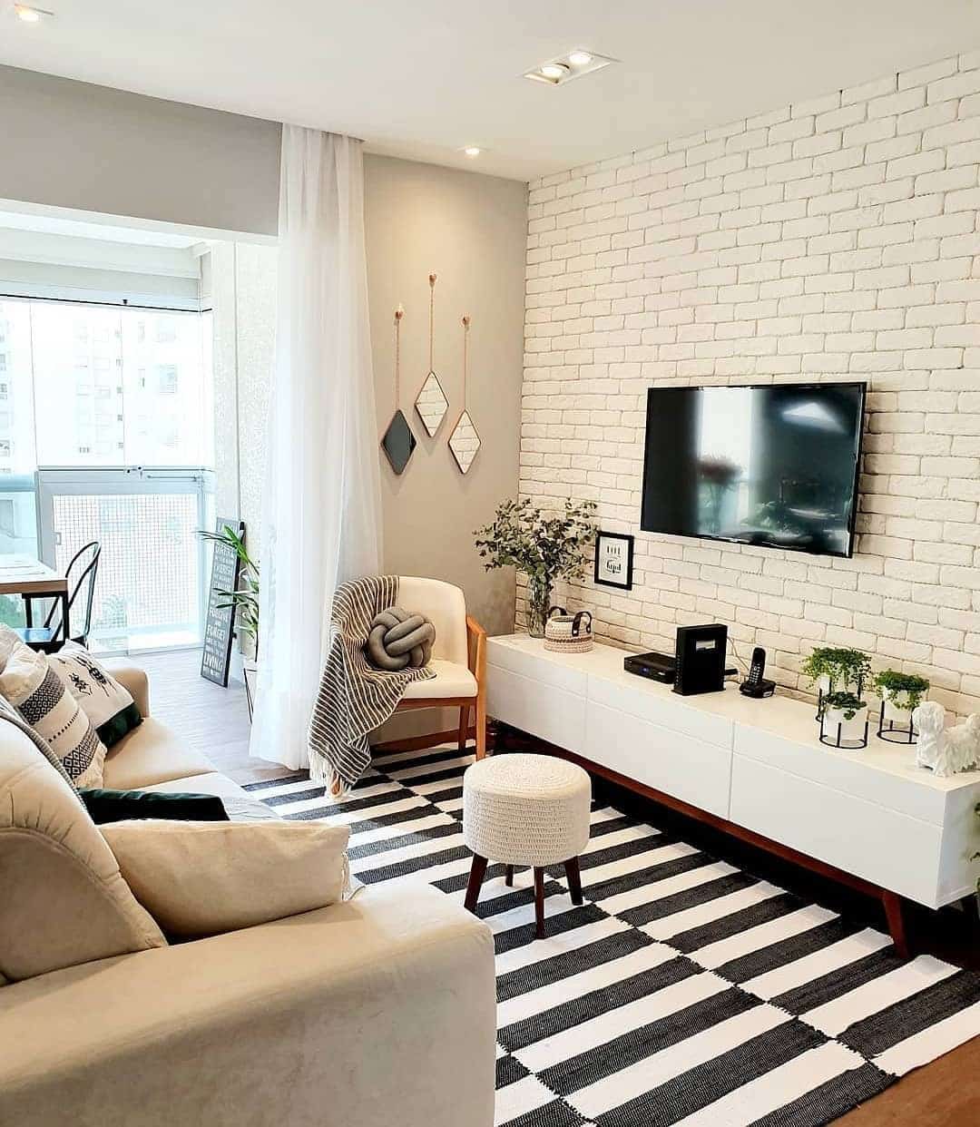 11. Modern Neutral Living with Graphic Contrast - tiny living room ideas