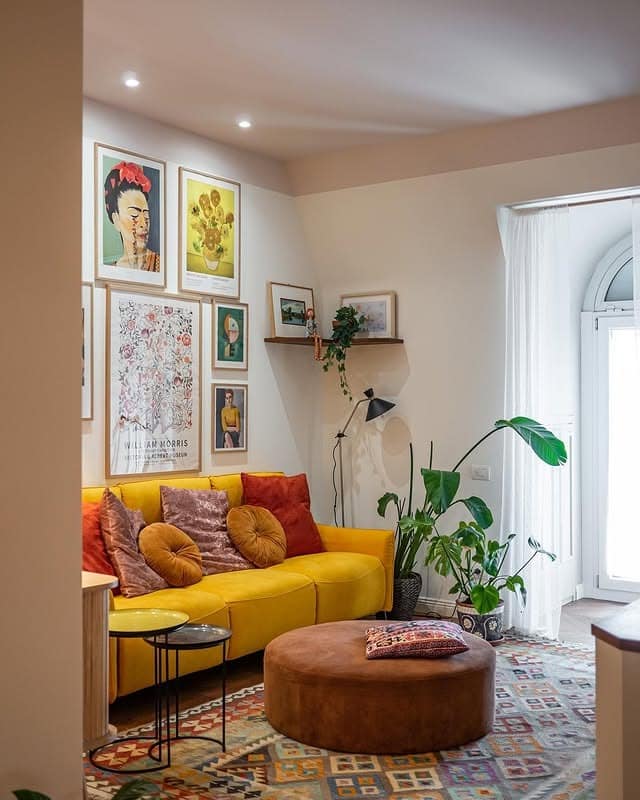 12. Artistic Small Living Room with Warm Accents - tiny living room ideas