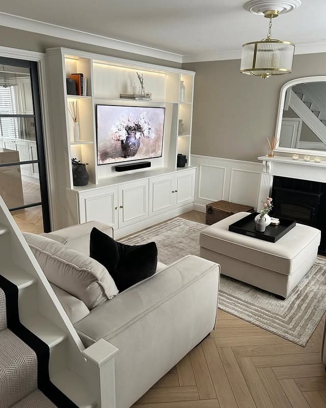 1. Classic Elegance with Light Oak Herringbone Floors - living room floor ideas