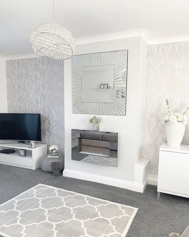 3. Soft Glam Living Room with Pale Grey Carpet - living room floor ideas