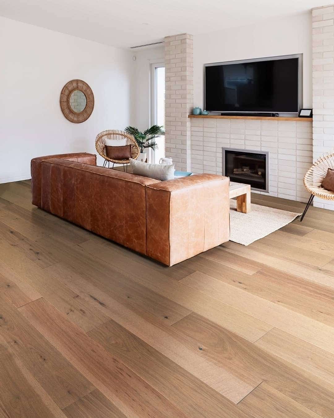 14. Natural Oak Flooring with Mid-Century Influences - living room floor ideas