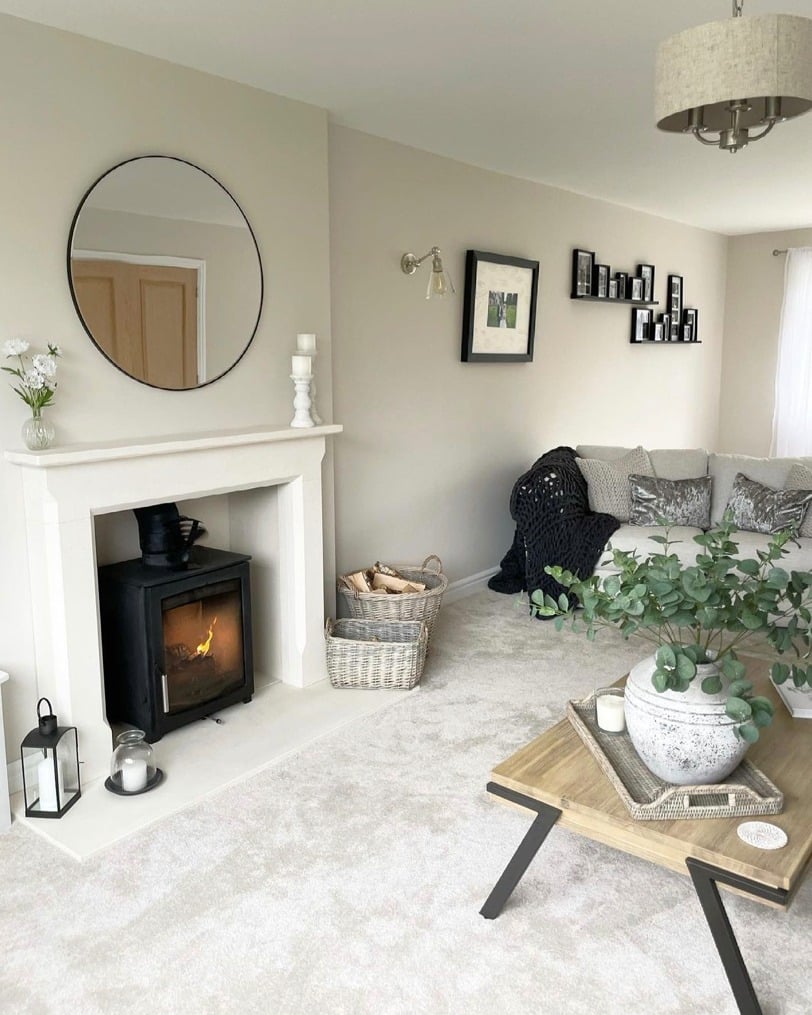 15. Soft Neutral Carpet for a Cozy Fireplace Living Room - living room floor ideas