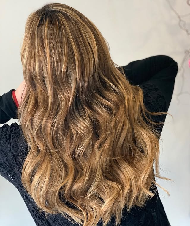 7. Textured Light Brown Waves with Soft Blonde Accents - Light Brown Hair with Highlights