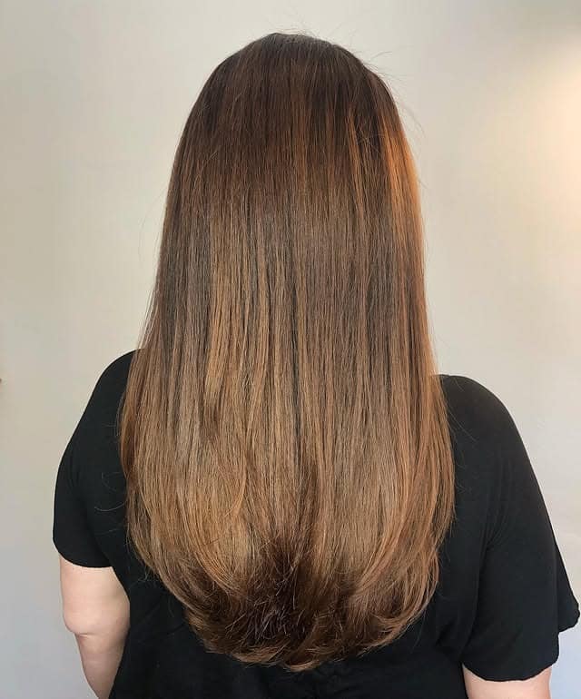 12. Sleek Long Light Brown with Subtle Highlighting - Light Brown Hair with Highlights