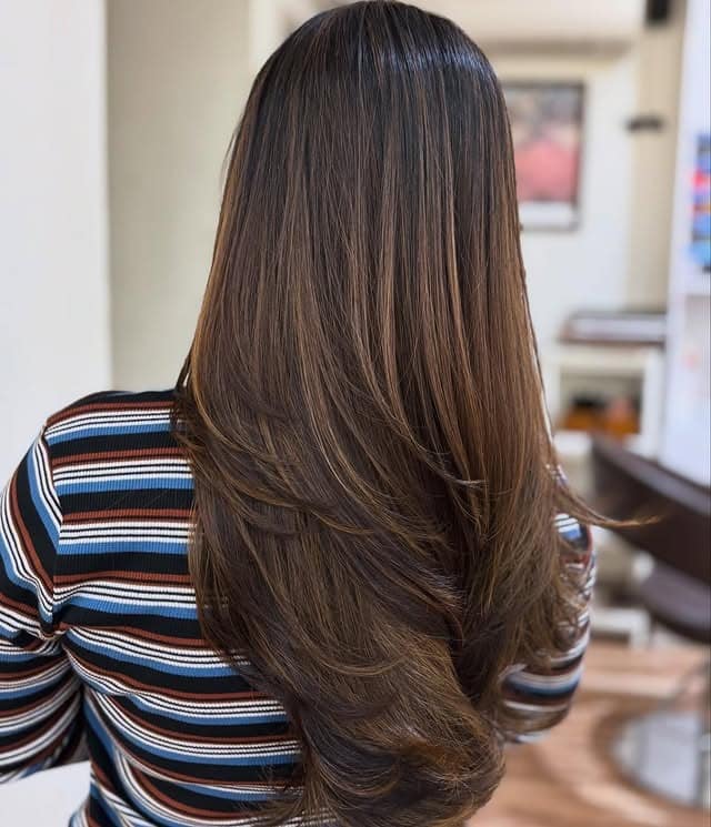 18. Rich Light Brown Waves with Balanced Highlights - Light Brown Hair with Highlights