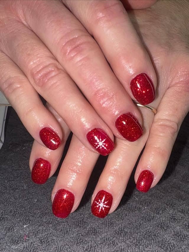 2. Ruby Sparkle Short Oval Nails - sparkly red nail ideas