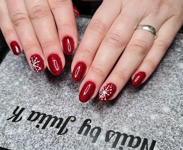 13. Red Glitter Nails with White Snowflake Art - sparkly red nail ideas