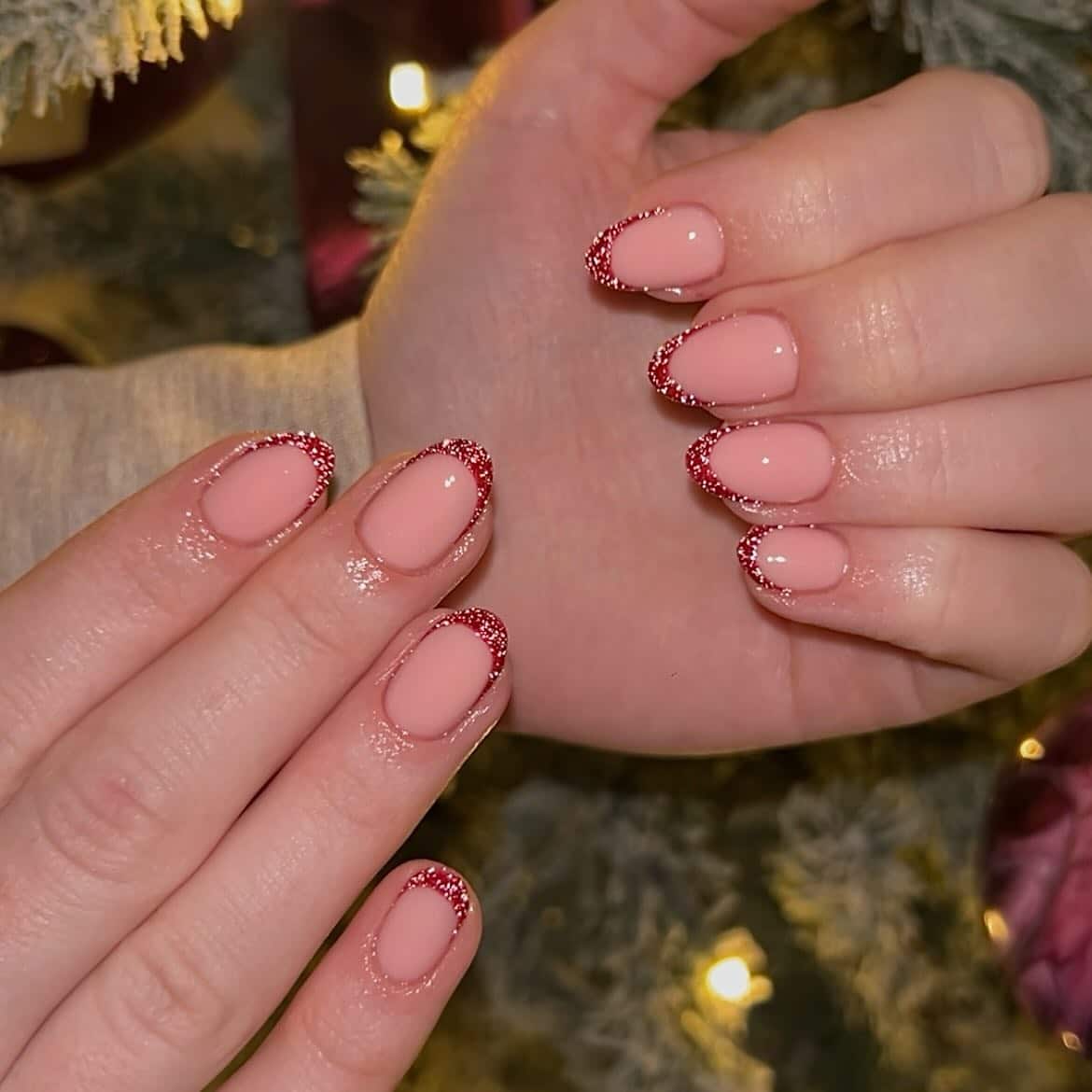 15. Nude Base Red Glitter French Nails - sparkly red nail ideas