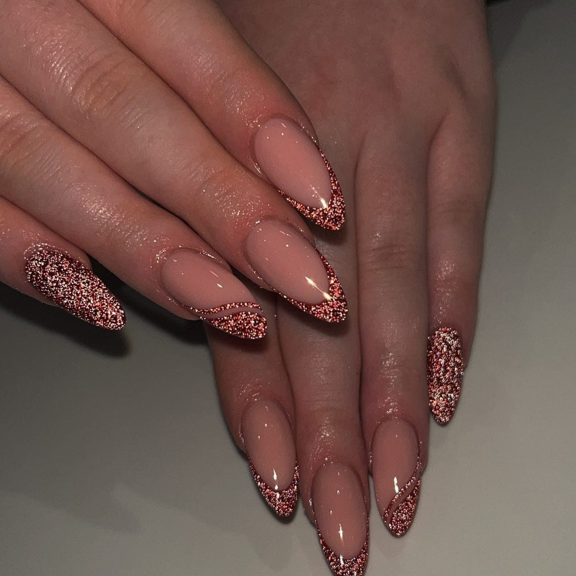 21. Nude and Red Glitter Stiletto French Nails - sparkly red nail ideas