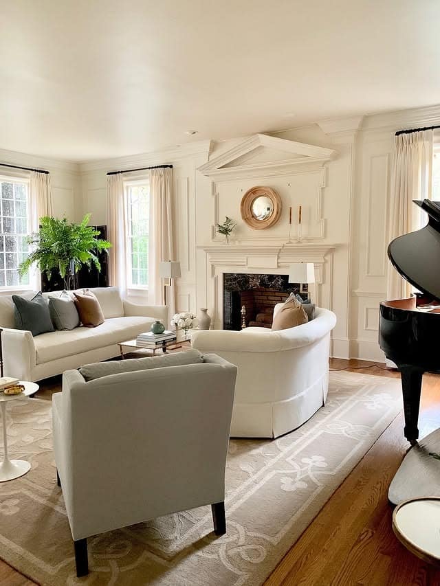 15. White Architectural Living Room with Classic Details - formal living room ideas