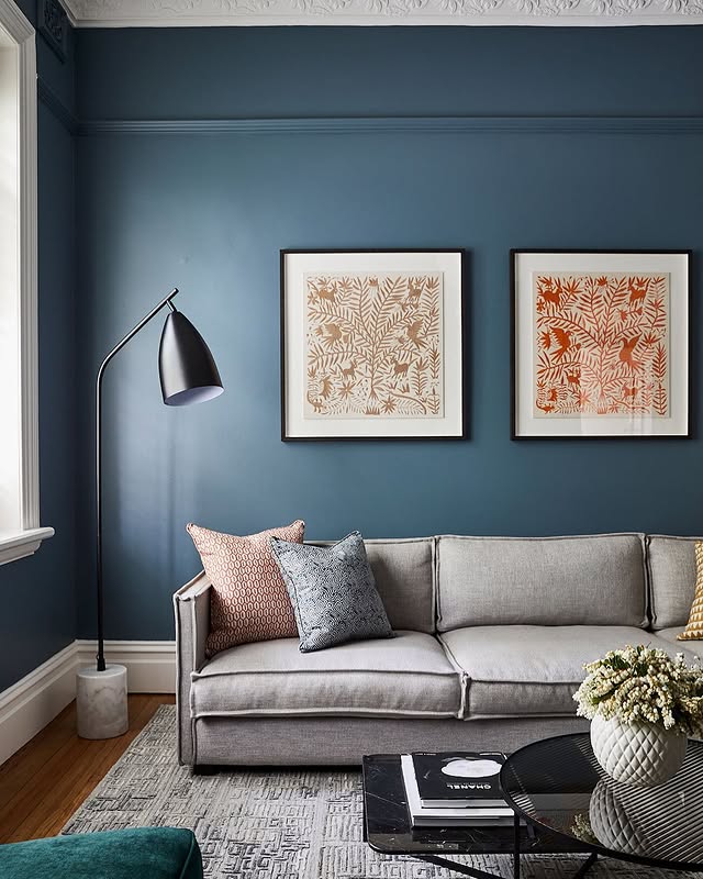 2. Soft Blue Walls with Tailored Grey Seating - blue and grey living room ideas