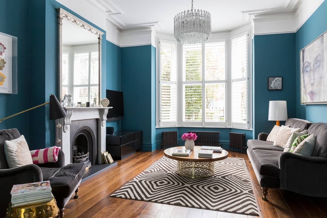 12. Classic Teal Blue Walls with Charcoal Grey Furniture - blue and grey living room ideas