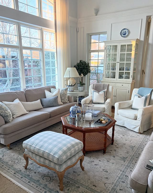 21. Soft Blue and Grey Living Room with Classic Styling - blue and grey living room ideas